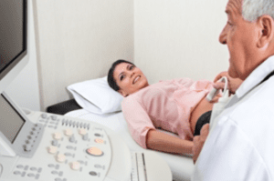 Pregnant woman with ultrasound