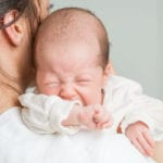 crying baby and mom
