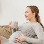 Mom-to-be with coffee