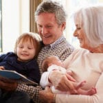 grandparents with toddler and newborn