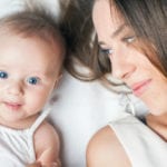 Mom and blue-eyed baby
